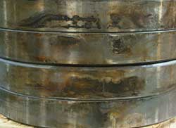 Fretting corrosion on the outer diameter of a multi-row tapered bearing.